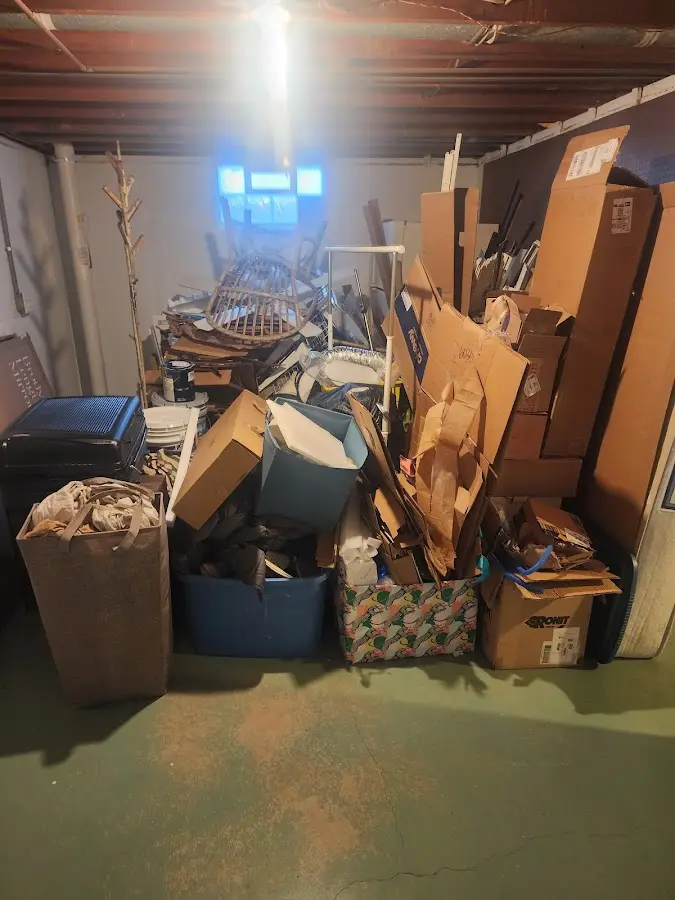 Roll-off dumpster container at job site for Construction Dumpster Rental in Roland